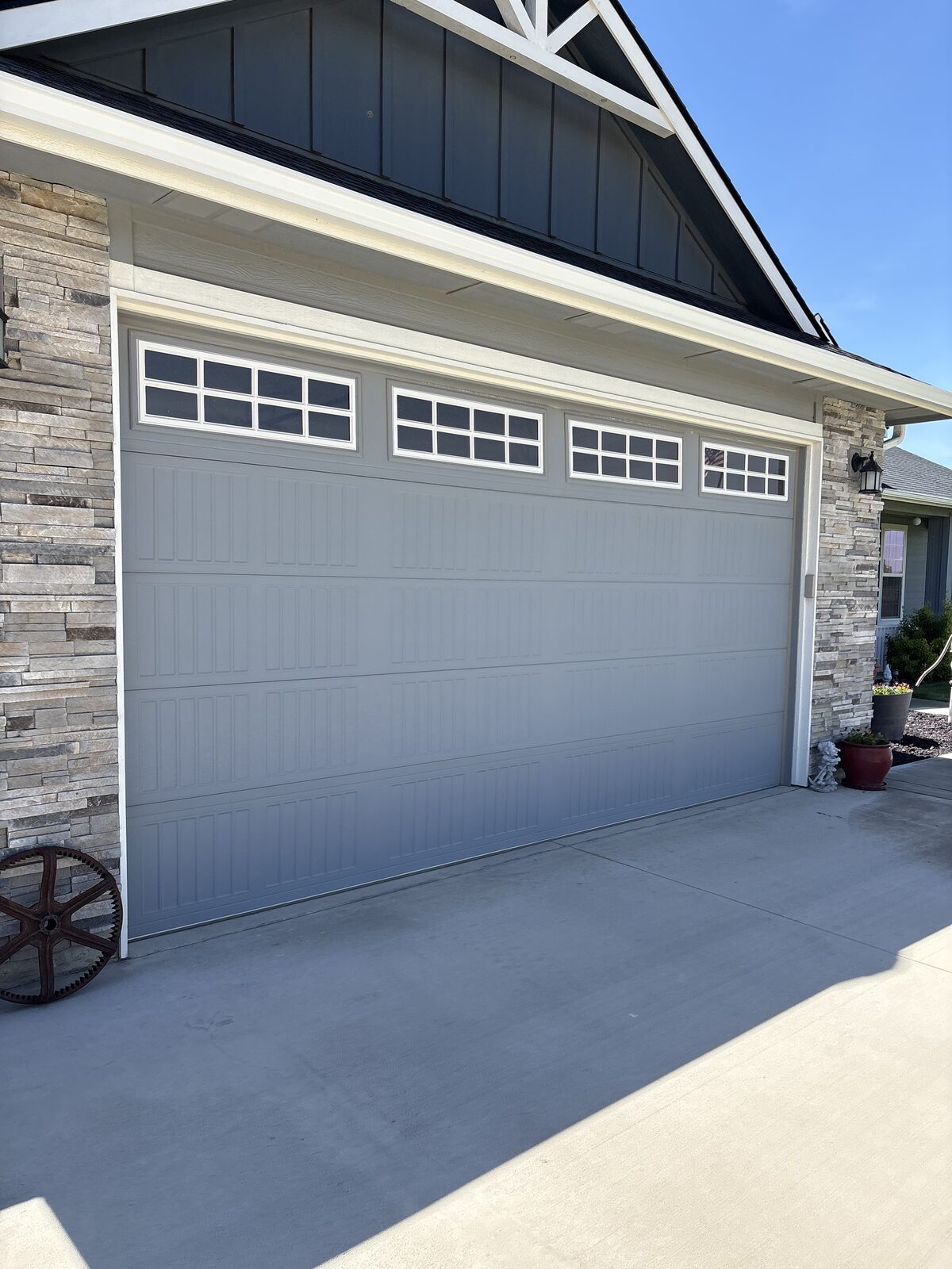 Carriage-style garage door installed by UP & FIX