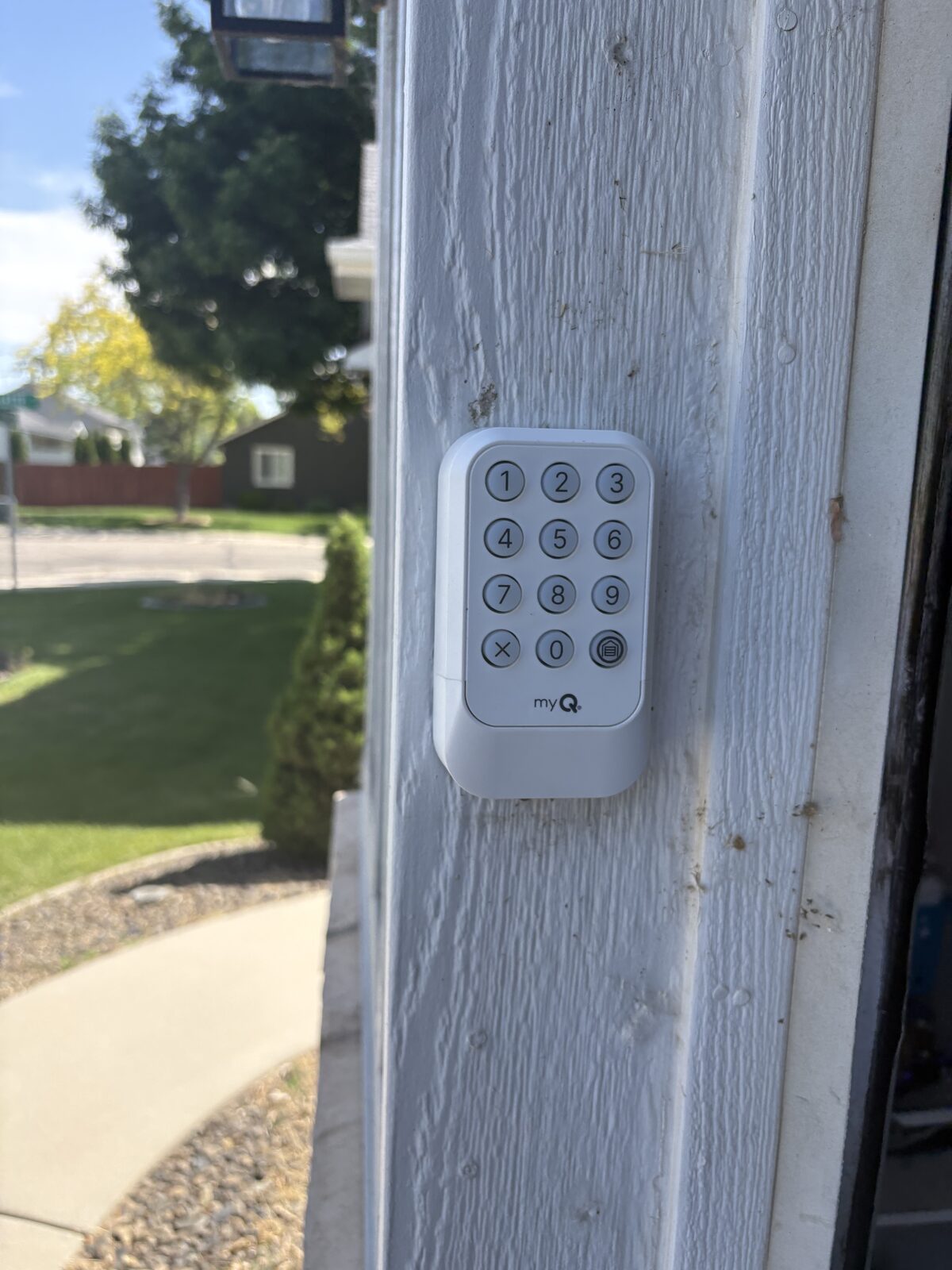 Exterior garage door keypad programmed by UP & FIX