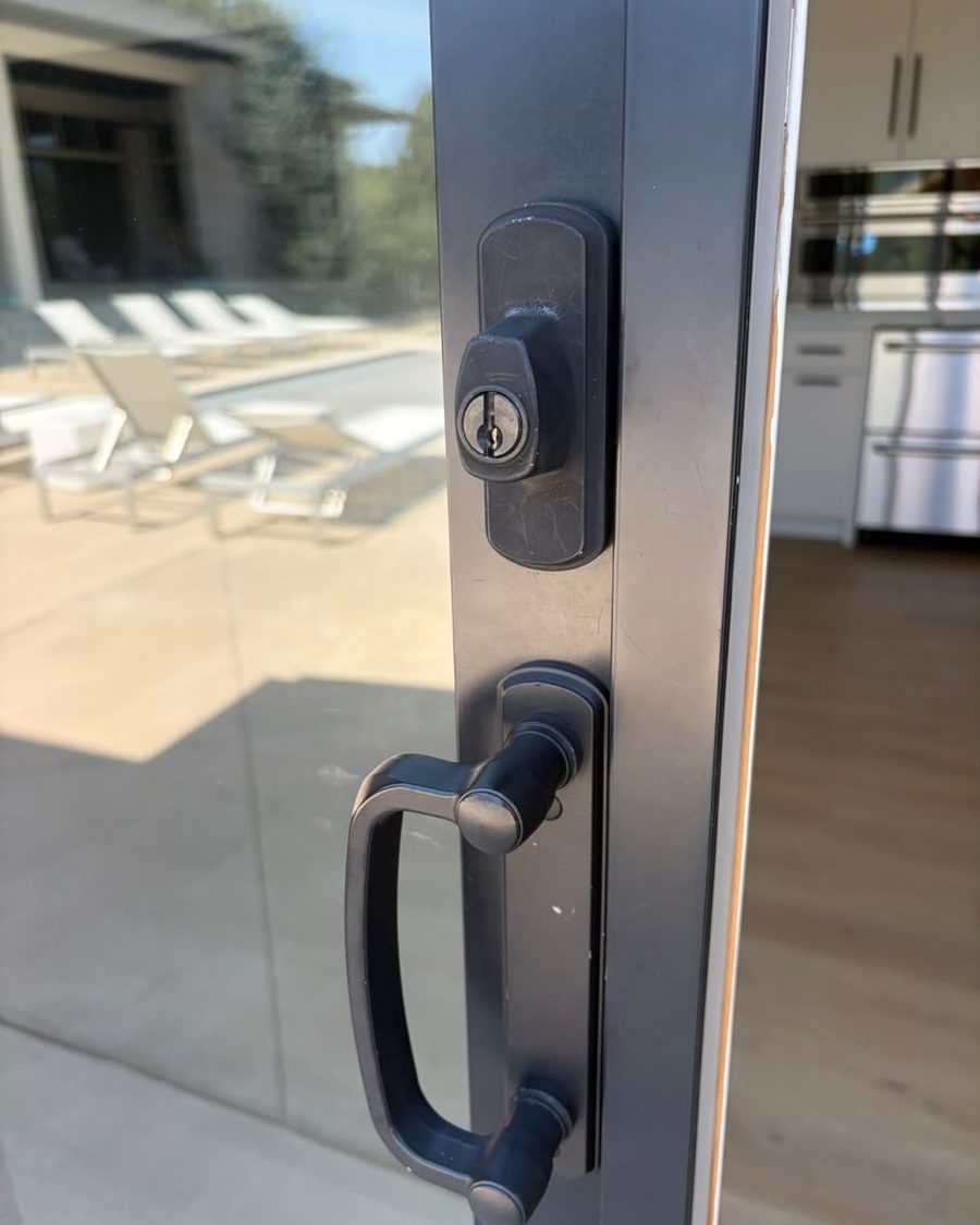 Deadbolt and handle set on a glass patio door
